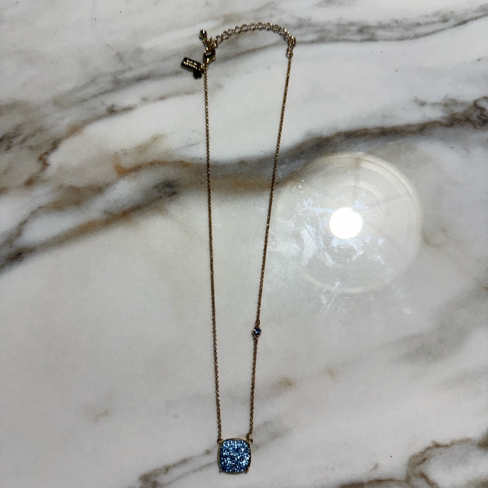 Elegant Gold Necklace with Blue Pavé Pendant